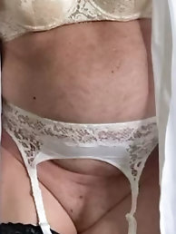 Curious older women, also known as MILFs, are posing completely in the nude.