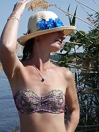 A gallery of women showcasing their legs on a wooden stage