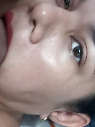 Seductive older woman dressed in revealing attire