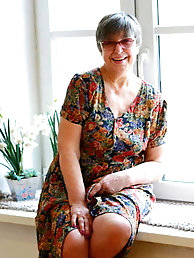 Hot blonde granny Jewel licks her red lips as she gets naked