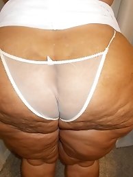 An aged nymph is covered with semen after a passionate session