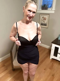 Mature prostitute gets naked